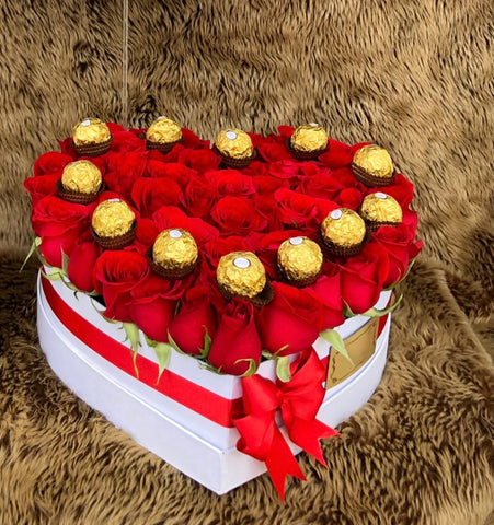 Corazón de rosas con ferreros